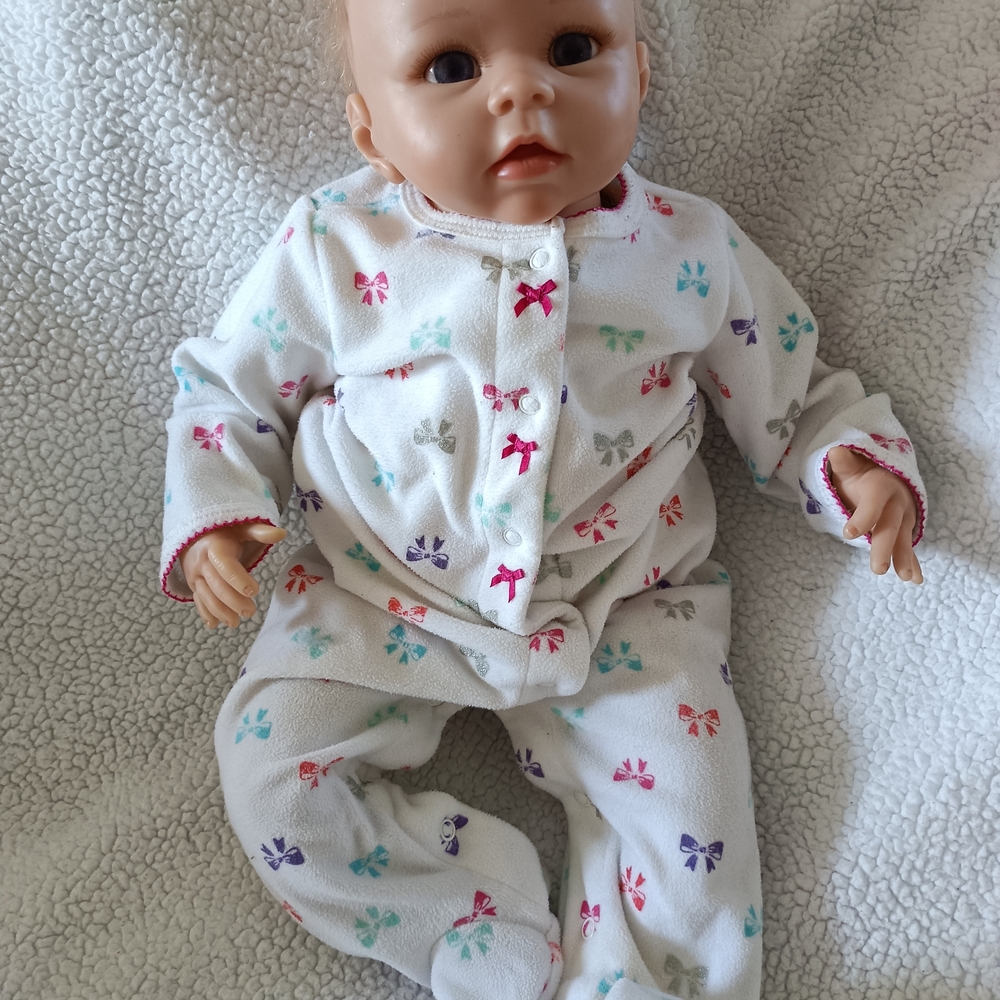 Adorable Baby Doll with Colorful Bow Print Outfit